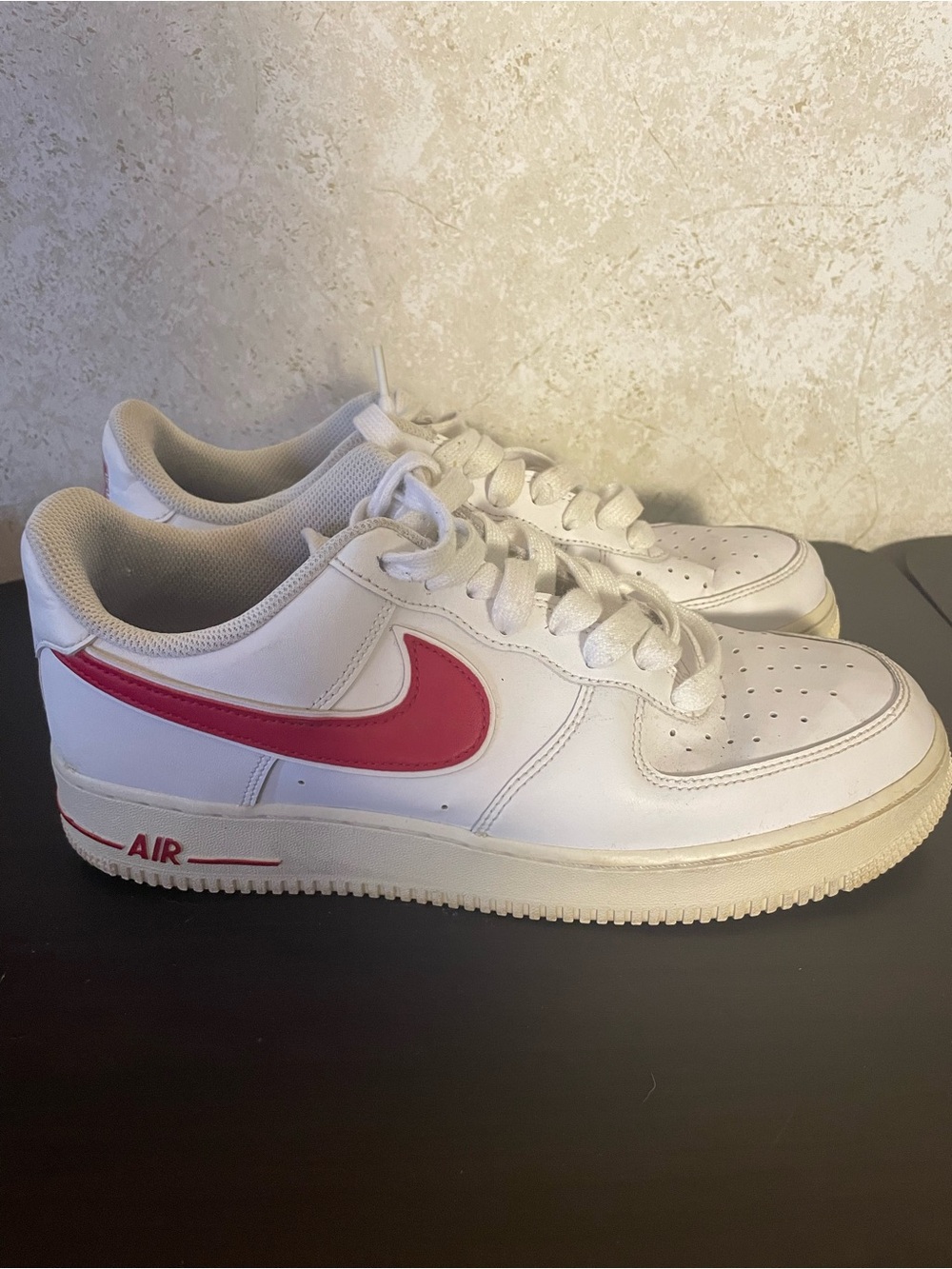 Nike Air Force 1 All-White Low Top Sneakers with Red Swoosh